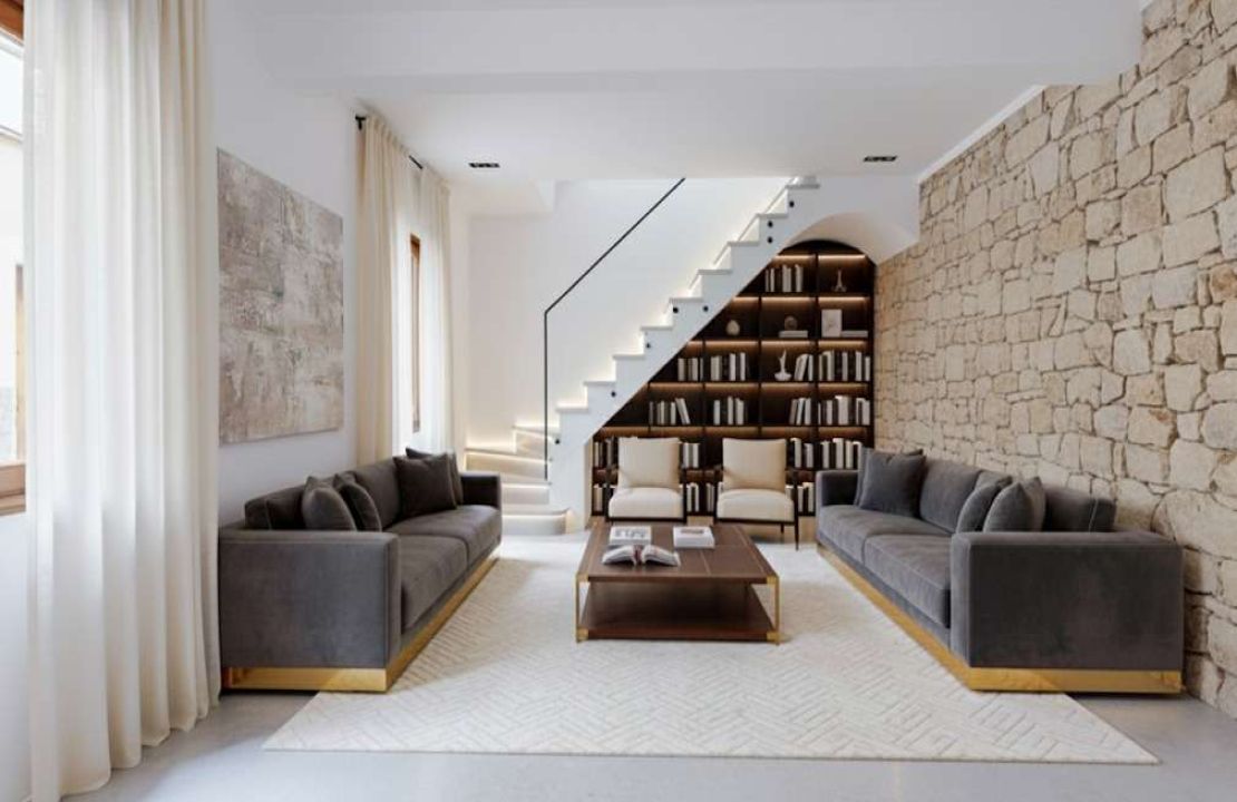 Townhouse in Pollenca Mallorca with large patio and renovation project